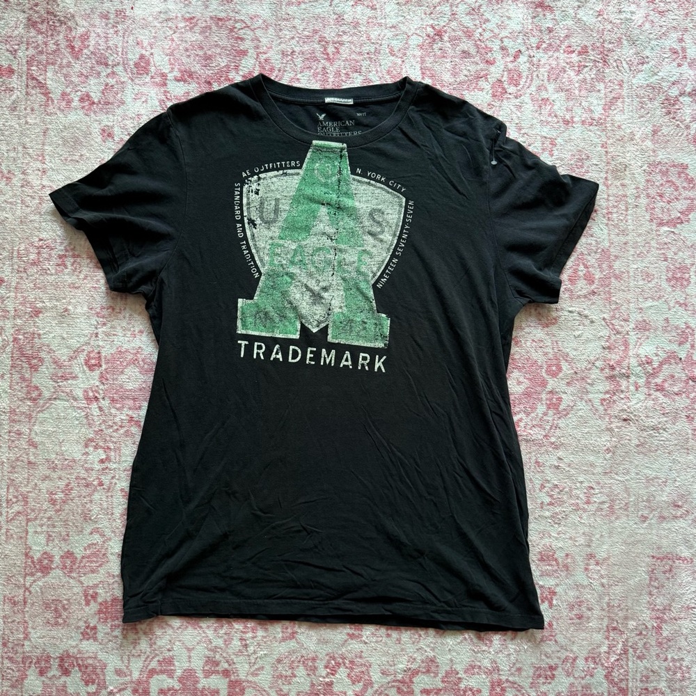 American Eagle Outfitters Black Tee with Green Distressed 'A' Graphic